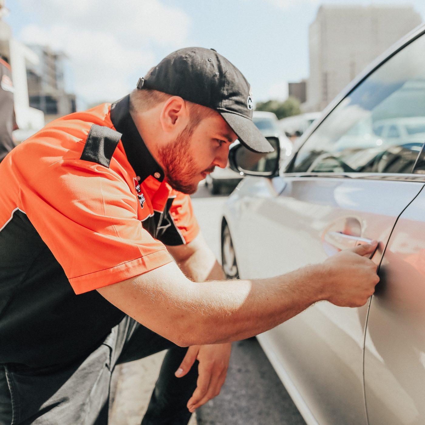 All Valley Pop-A-Lock technician unlocking a customer's vehicle